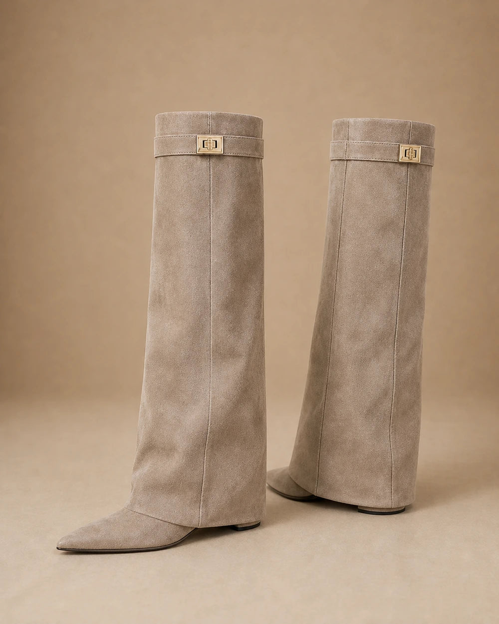 Women's beige suede-effect gold-clasp wedge knee-high boots, product-only pair.