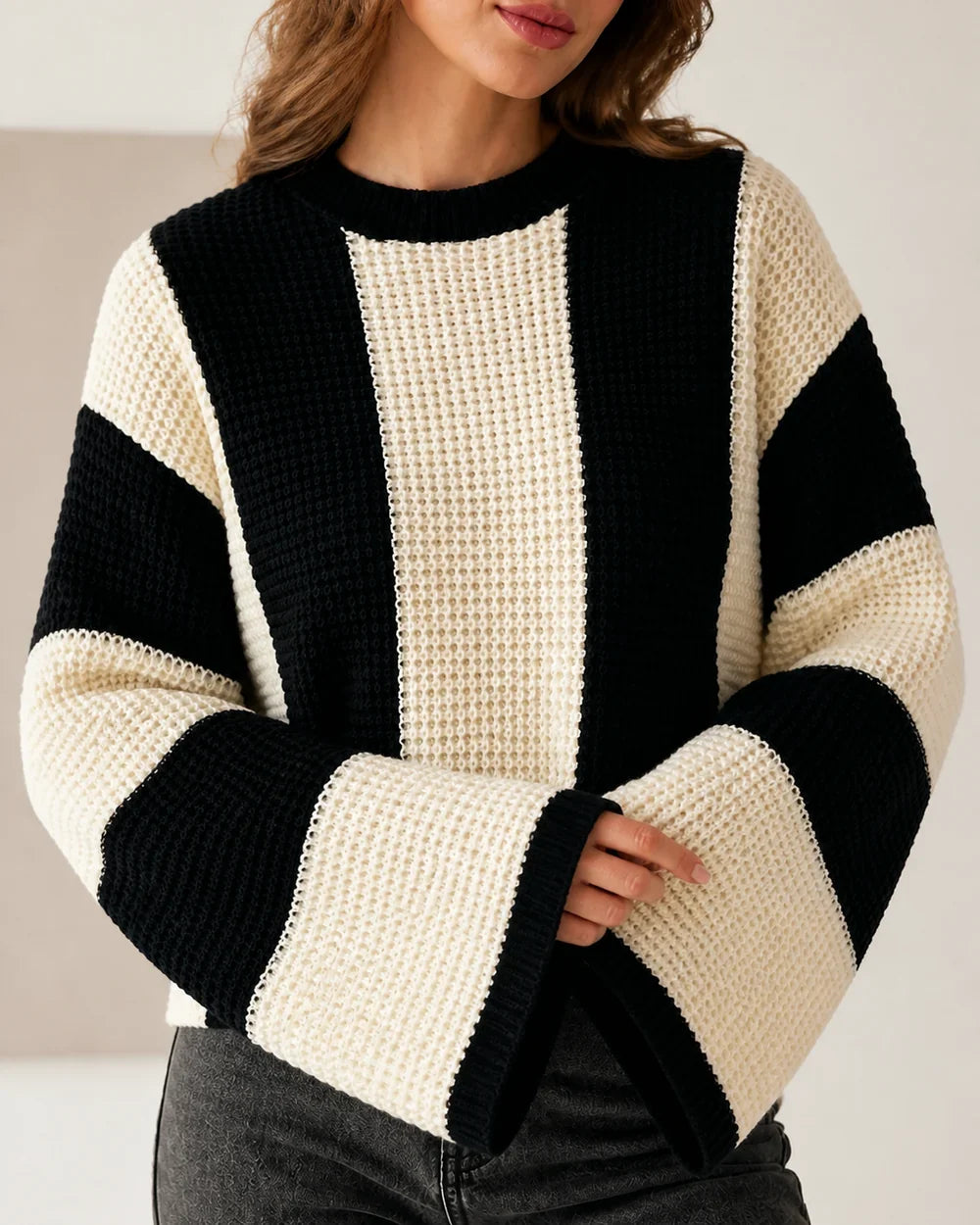 Women's beige black-and-cream color-block sweater, knit detail