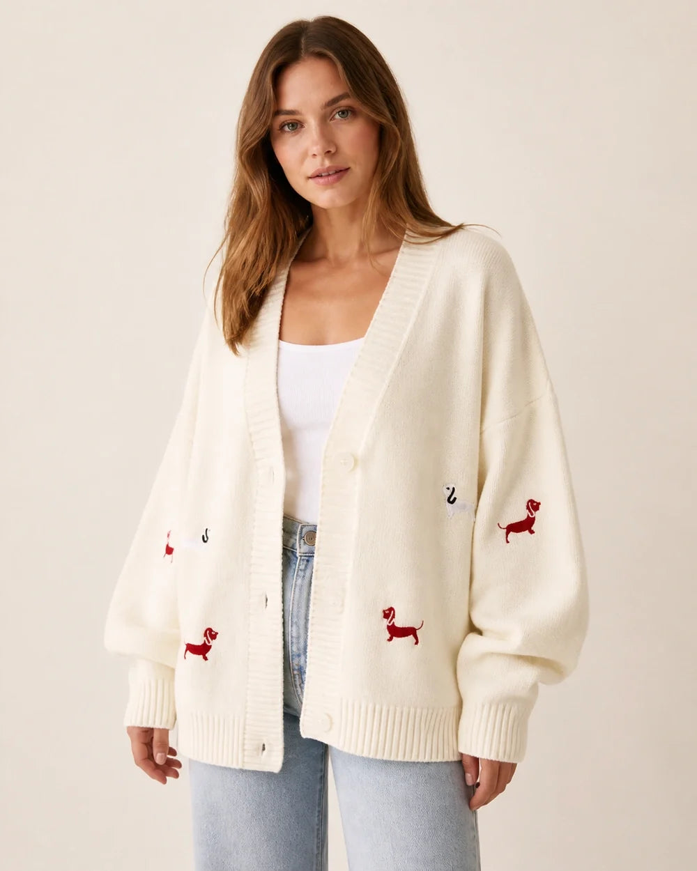 Women's white dachshund motif cardigan, product-first worn front view