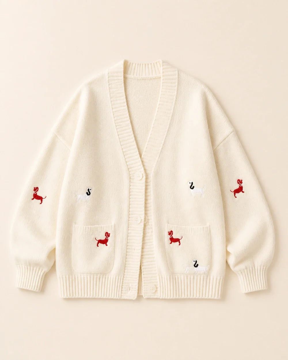 Women's white dachshund motif cardigan, product-only flat lay