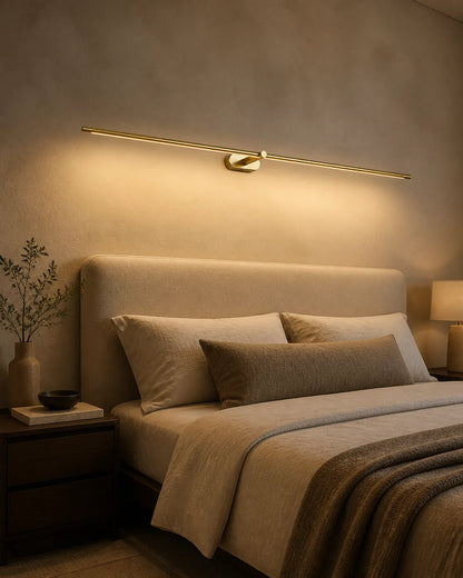 Gold Linear LED Wall Lamp in a warm modern bedroom