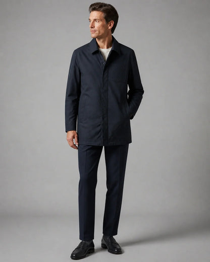 Dark blue mid-length coat for men, three-quarter view.