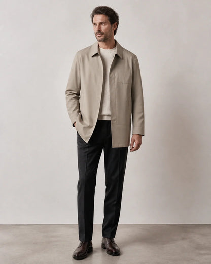Khaki mid-length coat for men, worn full-length hero view.